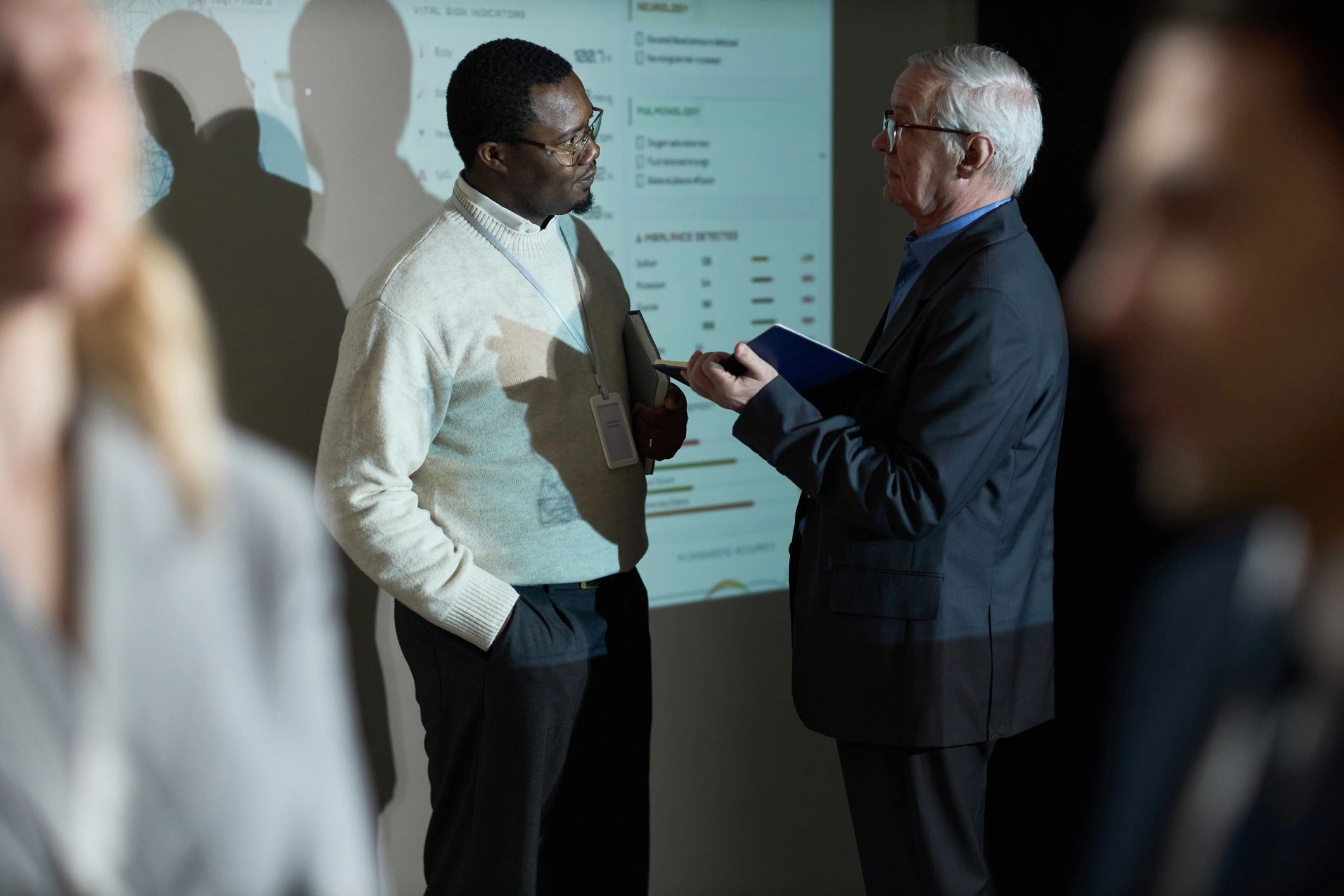Business leaders reviewing energy market data